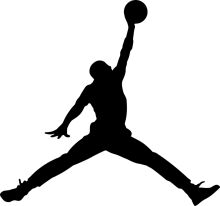 Silhouette of a Basketball Player in Mid-Air