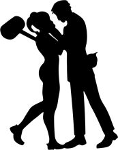 A Silhouette of a Couple in a Dance Pose