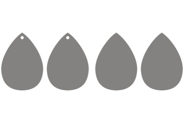 A Set of Three Gray Drops on a White Background