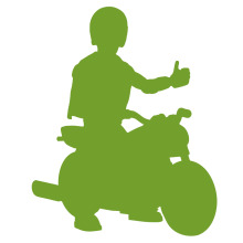 A Silhouette of a Person Giving a Thumbs-Up on a Motorcycle