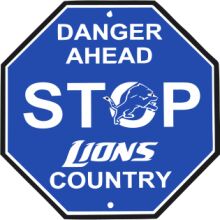 Blue Stop Sign with Lion Logo and Warning