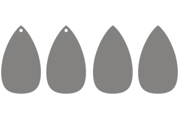 A Set of Three Gray Drop Shapes