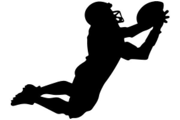 Silhouette of a Football Player Catching a Ball