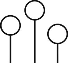 A Line of Four Black Circles on a White Background