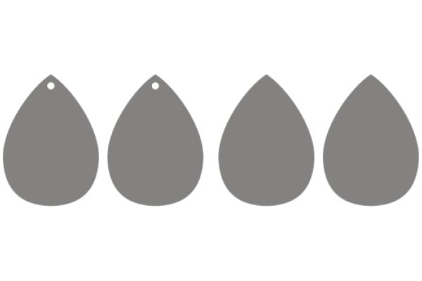 A Simple, Minimalist Design: Three Gray Drops on a White Background